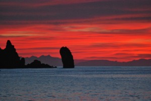 Tramonto con il Faraglione,Montecristo e la Corsica.